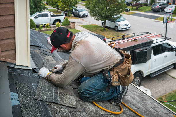Professional Emergency Roof Repair technician working in Manhasset, NY